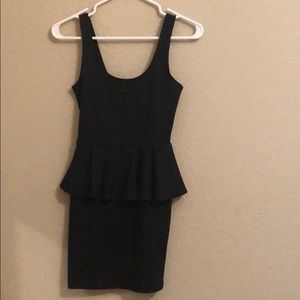 Fitted black peplum dress